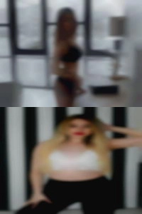 Naked girls UK on a bed with hand up her bits